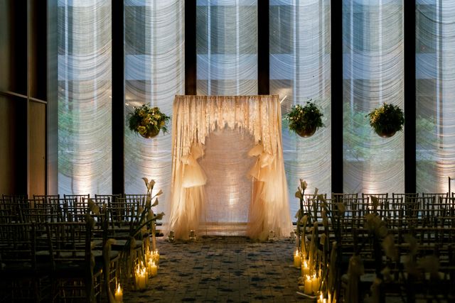 Featured photo from Inside this Modern Wedding at The Grill + The Pool Framed by Tall Windows and Candlelit Details