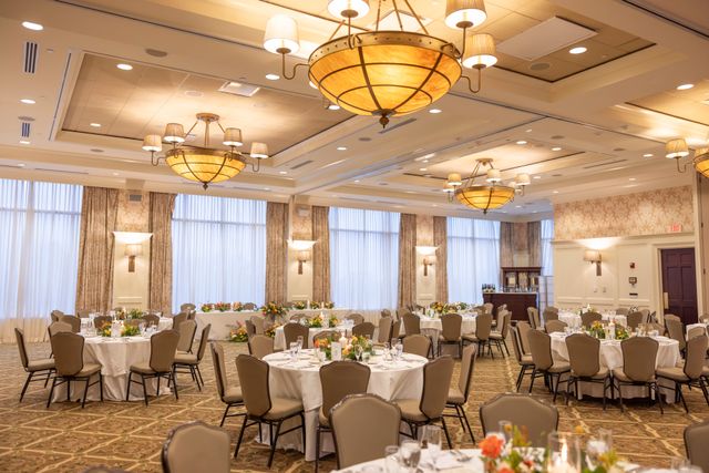 Featured photo from A Warm-Toned Wedding Featuring Layered Florals and Soft Candlelight at Ocean Edge Resort