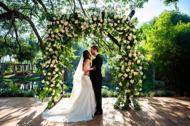 Featured photo from Inside this Outdoor Wedding with Lush Greenery and Rustic Elegance at Living Sculpture Sanctuary