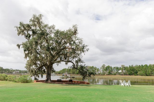 Featured photo from Lauren and John's wedding at Dunes West