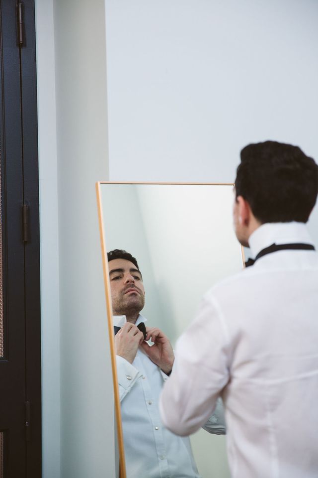 Featured photo from Modern Orthodox Jewish Warehouse Wedding with Winter Florals and Greenery at 99 Scott in Brooklyn