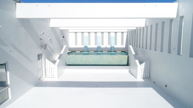 Featured photo from The Temple House Outdoor Terrace - Second Level Grecian South Beach Oasis with Water Feature