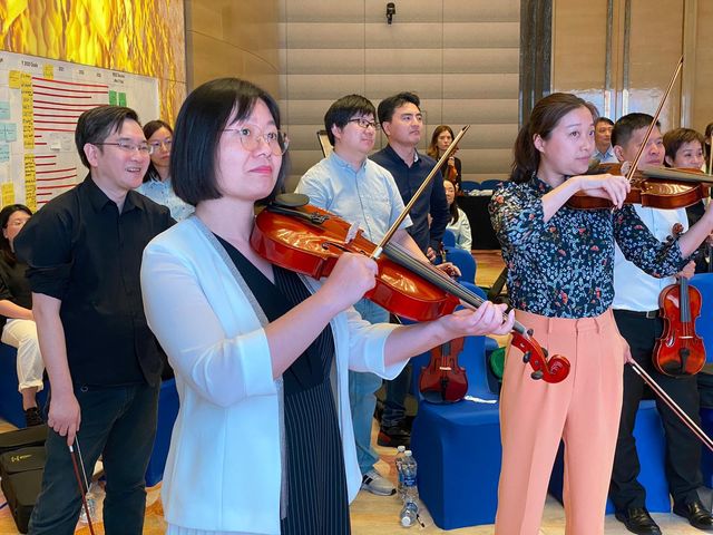 Featured photo from Crescendo Violin Team Building