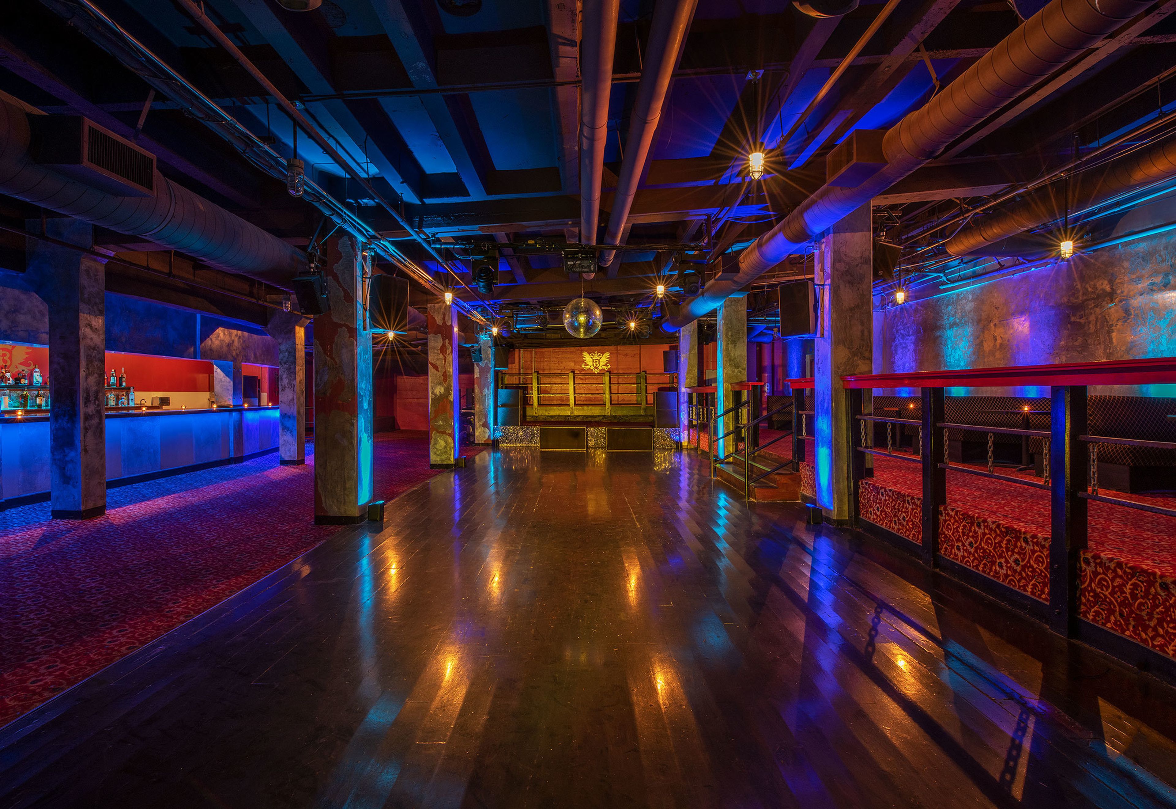 Below, an event space at The Belasco Theater