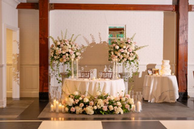 Featured photo from Step Into This Classic Wedding at Central Park Boathouse with Soft Green Accents and Lush Rose Garlands