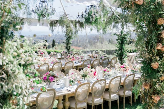 Featured photo from Elegant Montecito Birthday Celebration in Clear Tent with Chandeliers, Tree-Inspired Installations, and Colorful Summer Blooms
