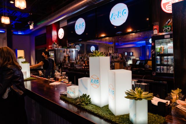 Featured photo from A-RO Baseball Themed Blue and Orange Tented Milestone Event at the Fire Pitch