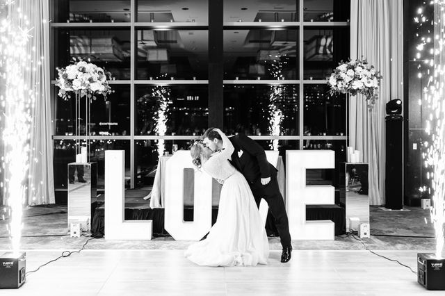 Featured photo from A Classic New England Wedding overlooking Boston Harbor in the Rose Kennedy Ballroom