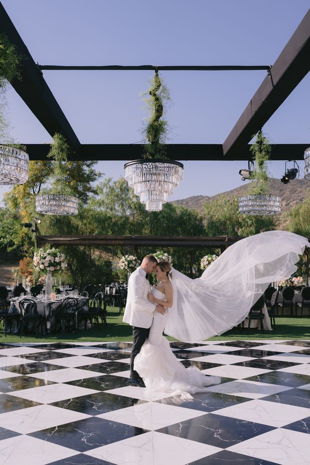 Featured photo from Outdoor Wedding at Hummingbird Nest Ranch in Simi Valley, California