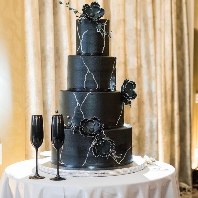 Featured photo from Patterned Black Wedding Cake with Stunning Unique Florals