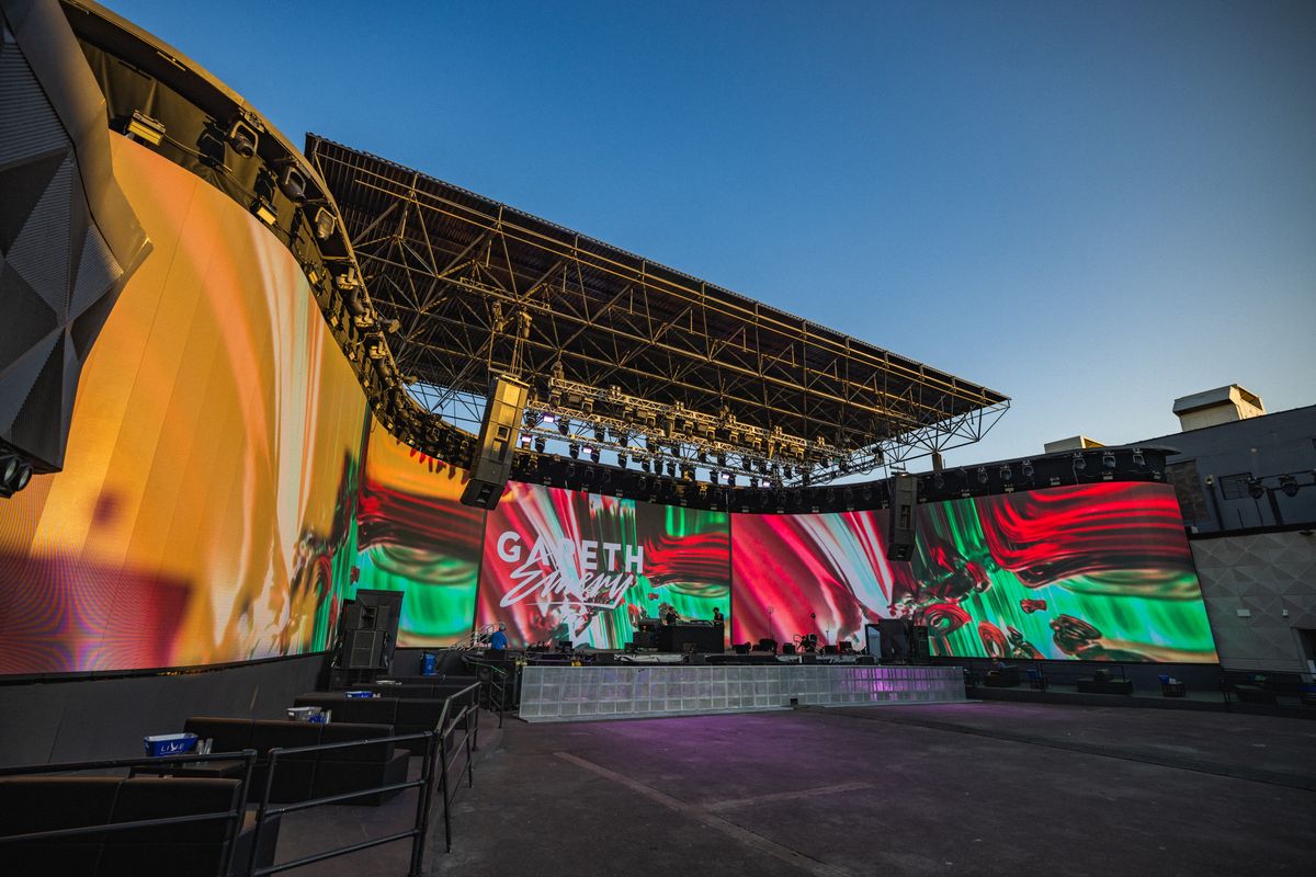 Avant Gardner Brooklyn Mirage outdoor stage with massive curved LED video wall during a performance
