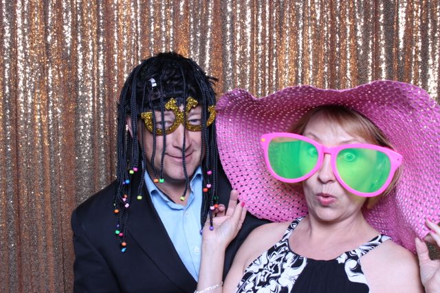 Featured photo from Ashley & Sean's Gold Wedding Booth