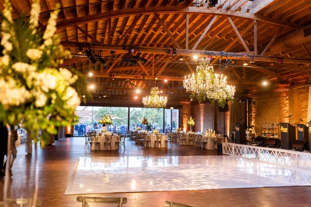 Featured photo from A Classic Wedding Featuring Loft-Style Architecture, Warm Wood Tones, and Glowing Chandeliers in Chicago