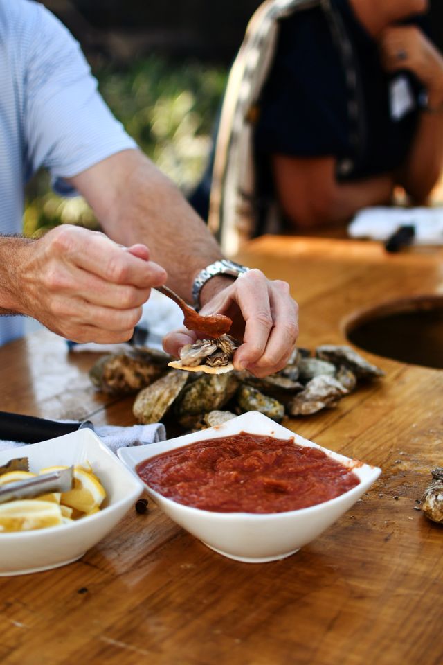 Featured photo from East West Oyster Roast at The Cape on Kiawah in Kiawah Island, South Carolina