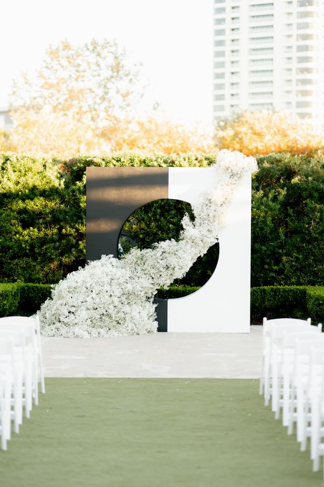 Featured photo from Glamorous White Wedding at McGovern Centennial Gardens in Houston, Texas