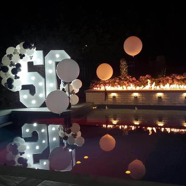 Featured photo from 50th Birthday Backyard Bash with Live Music and Fresh Food.