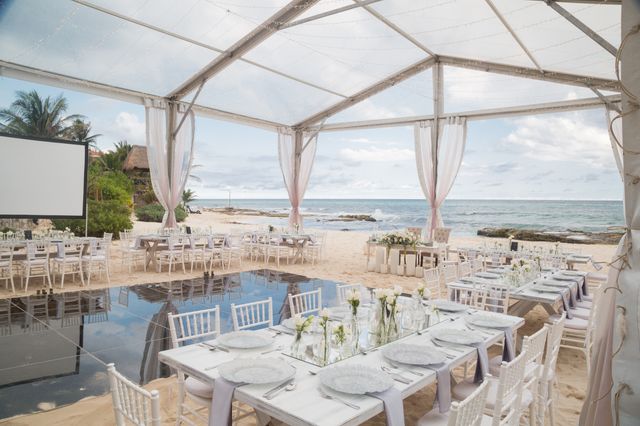 Featured photo from Tented Beach Wedding