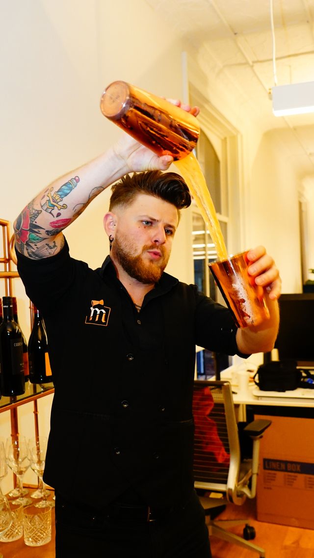 Featured photo from Experience Excellence: Flair Bartending and Artisanal Cocktails Elevated this Office Party