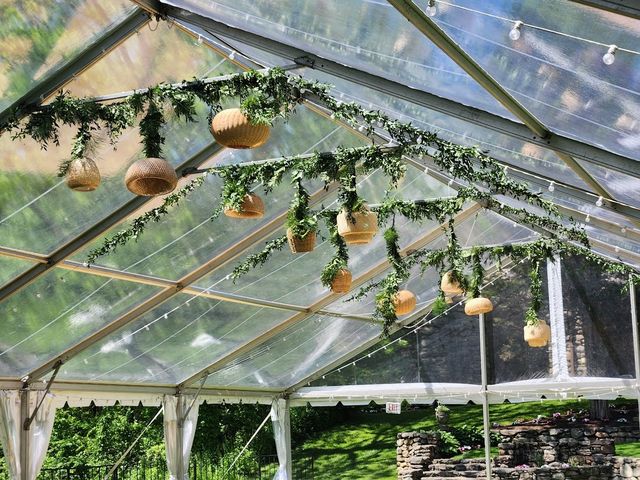 Featured photo from Take in this Gorgeous Greenery Ceiling Wedding