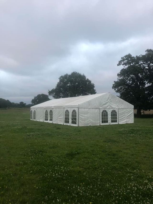 Featured photo from Setting up marquee in garden