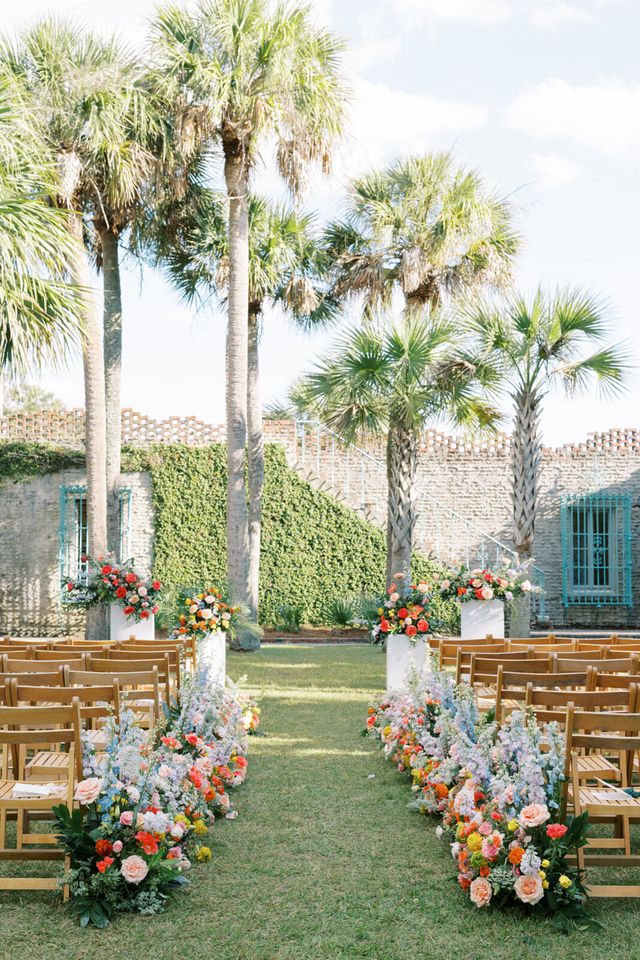 Featured photo from Sumner and Conrad's Whimsical Floral-Filled Celebration