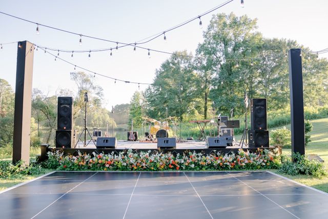 Featured photo from A Fall Floral Paradise wedding in Serenbe, the celebrity filmmaker community