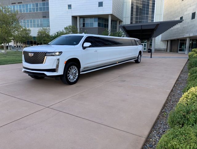 Featured photo from White Escalade stretch limo