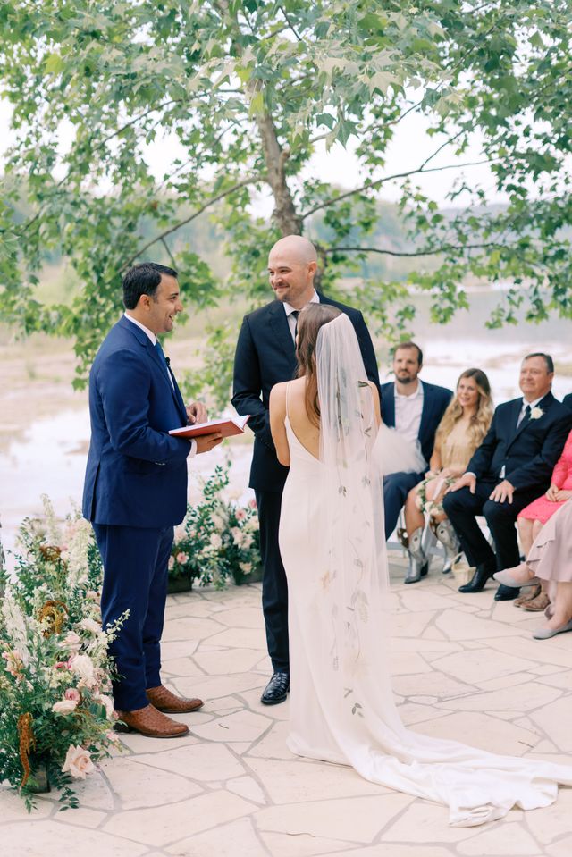 Featured photo from Blair and Chris' Waterfront Ceremony in the Texas Hill Country