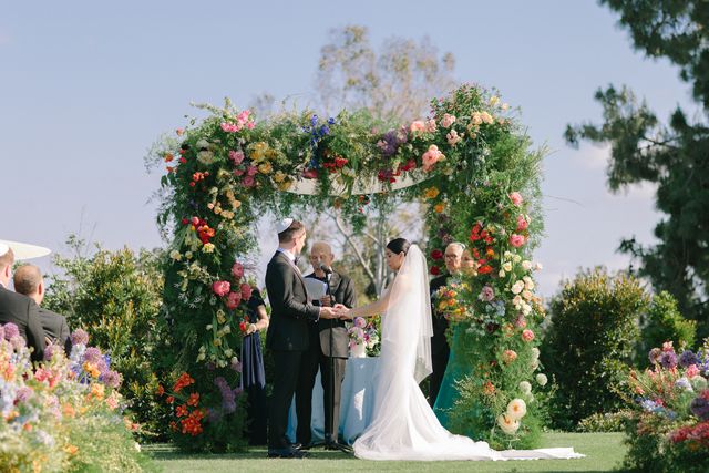 Featured photo from See This Colorful Country Club Wedding