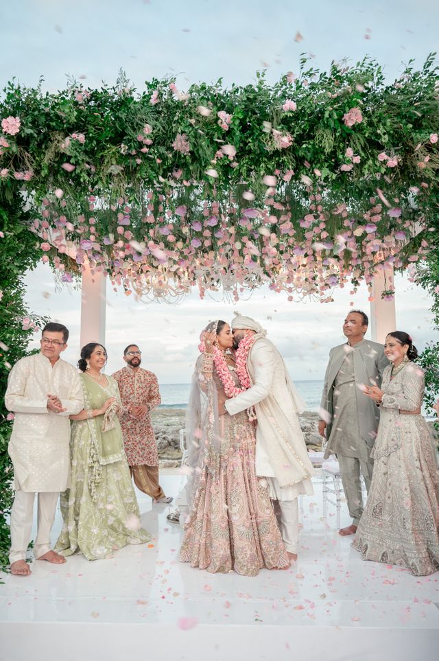 Featured photo from A Vibrant Hindu Wedding with Blush Florals and Beachside Views