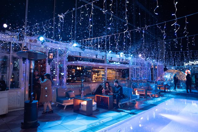 Featured photo from Inside This Immersive Holiday Party with Twinkling Canopy Lights and Festive Set Pieces at Level 8