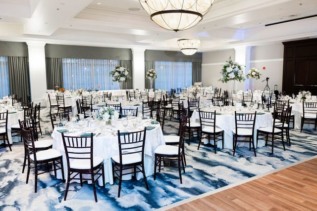 Featured photo from Wander Through This Serene White Wedding with Flourishes of Greenery in a Grand Ballroom