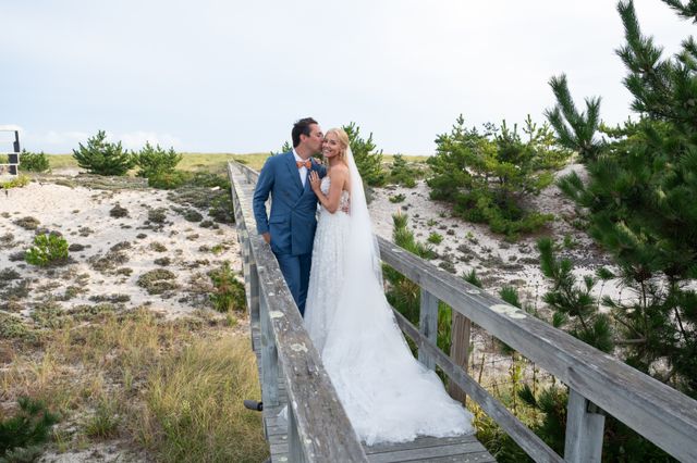 Featured photo from A Seaside Garden Wedding in Southampton with Elegant Tent Décor and Lush Blooms