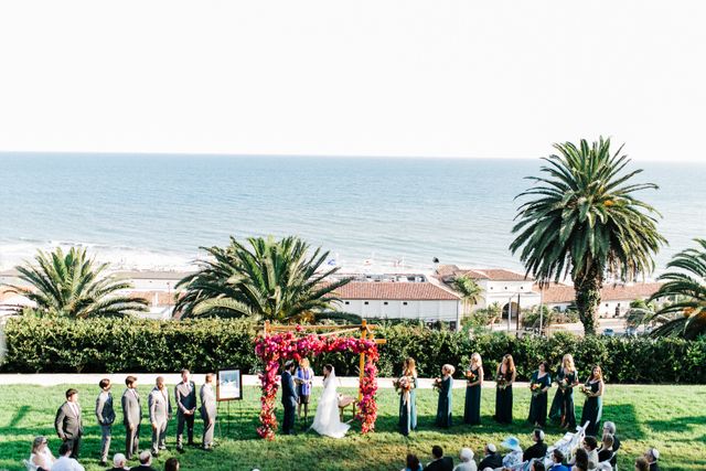 Featured photo from Colorful Tropical Jewish Bougainvillea Wedding at Bel Air Bay Club