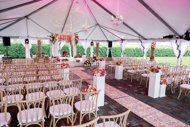 Featured photo from Step Into This Joyful South Asian Wedding at The Stallion Estate with Glamorous Tent Draping and Bold Floral Accents