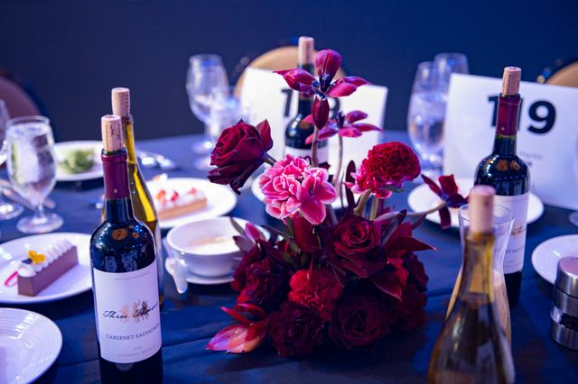 Featured photo from Experience This Sophisticated Gala with Crimson Florals and Rich Velvet Draping at Sheraton Dallas Hotel