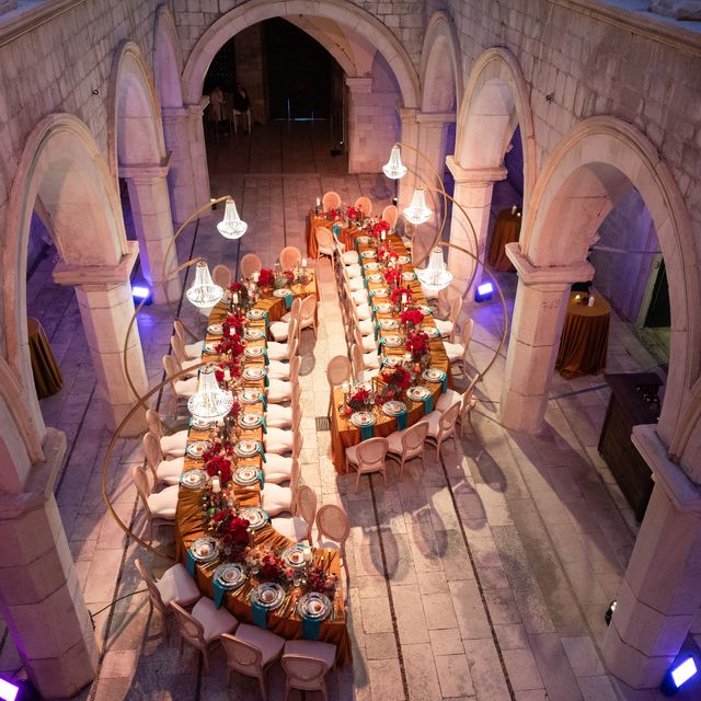 Featured photo from Take In This Dramatic Dinner Party Framed by Candlelight and Old-World Stonework at Sponza Palace