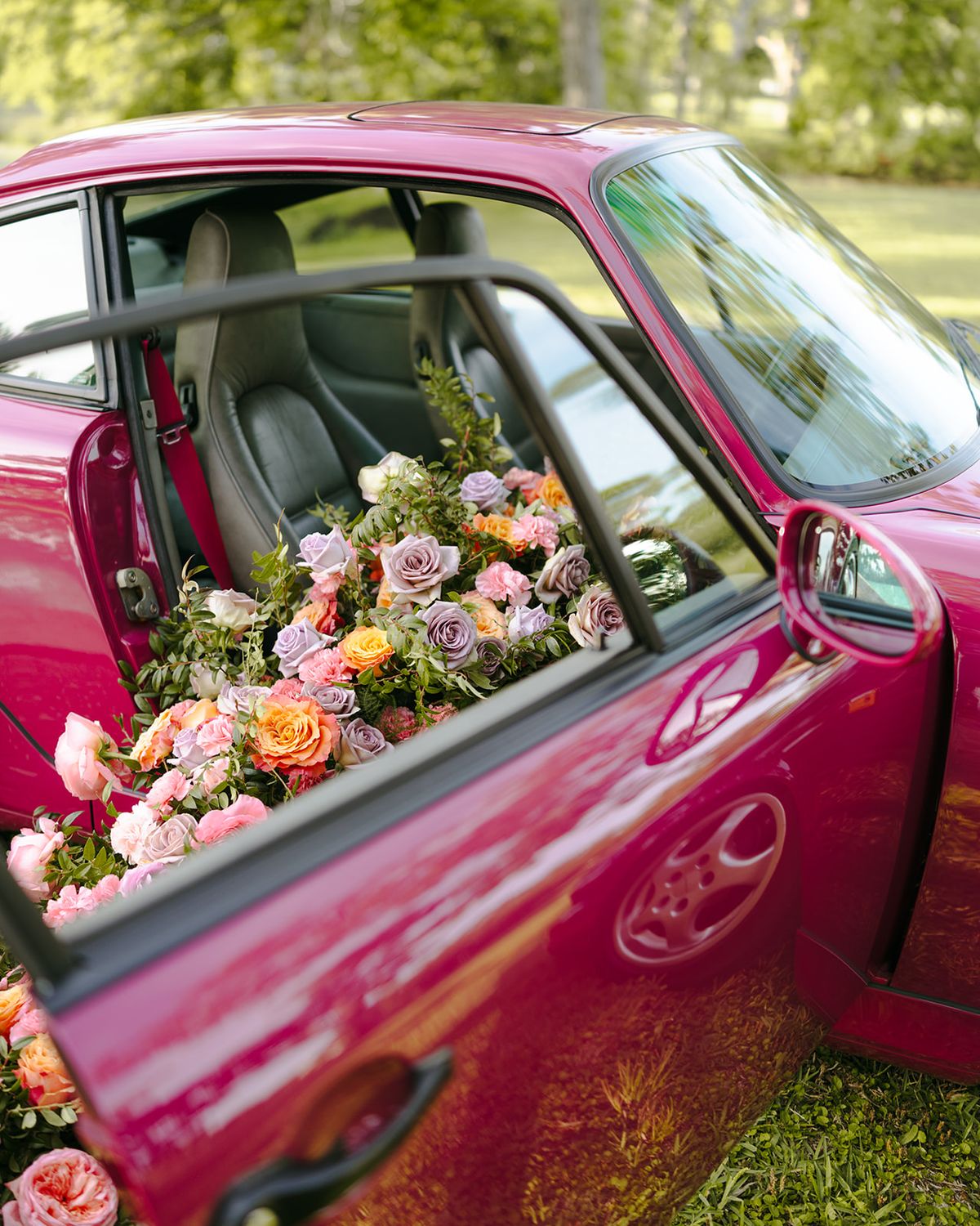 A Floral Drive: Ruby Rose Porsche 964 with Cascading Florals