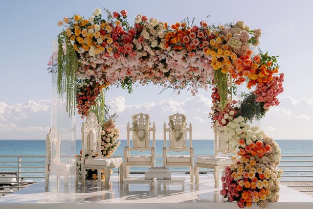Featured photo from Luxury Hindu Wedding at The Diplomat Beach Resort with an Ombre Floral Mandap
