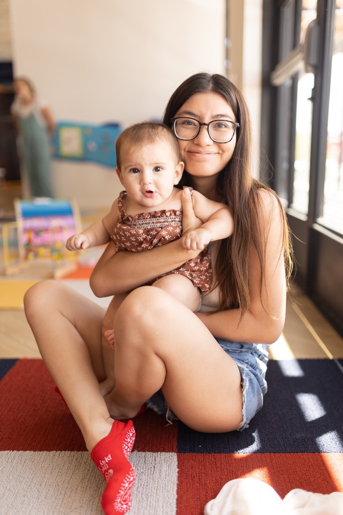 Mom and baby smiling together at The Little Play Avenue