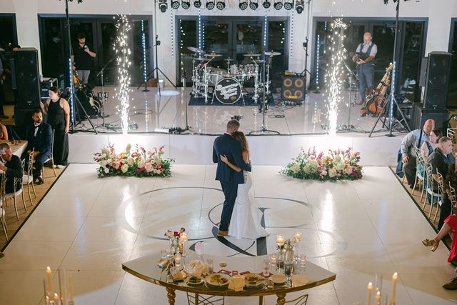 Featured photo from Celebrate This Romantic Wedding at Old Monroe Distillin Co with a Glowing Staircase and a Floral-Framed Celebration