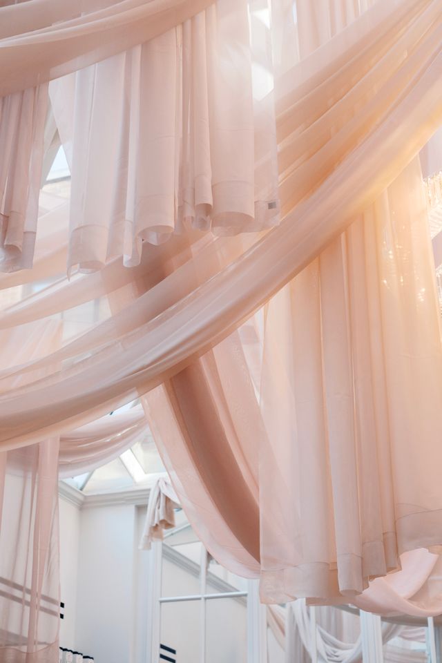 Featured photo from An Editorial-Style Wedding at The Adelphi Hotel Featuring a Draped Ceiling Installation