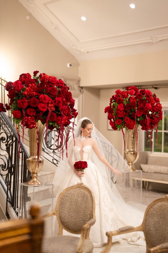 Featured photo from Revel In This Romantic Wedding at Park Chateau Estate and Gardens with Sculptural Rose Centerpieces and Deep Crimson Details