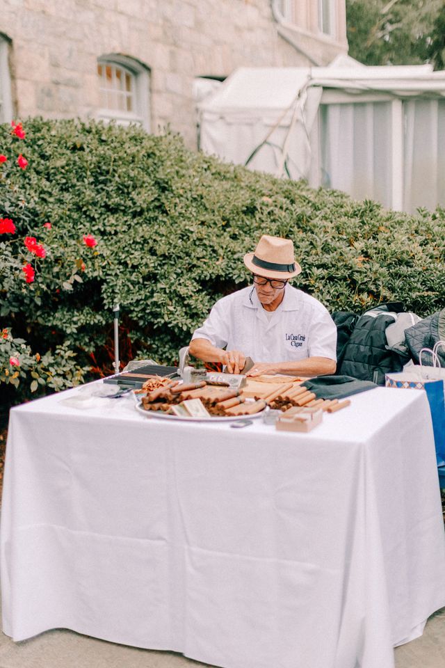 Featured photo from Hand-Rolled Cigars at a Waterside Wedding Ceremony