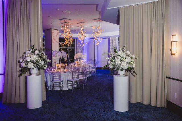Featured photo from Experience This Elegant Wedding with Candlelit Tablescapes and Dramatic Blue Lighting at The Ritz-Carlton