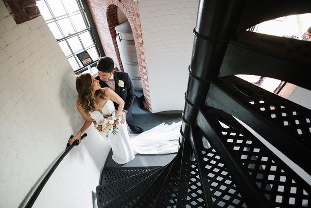 Featured photo from Witness This Sophisticated Wedding at Pelican Club with Gold Candle Holders and Romantic Reception Design