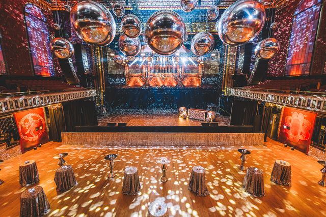 Featured photo from See This Vibrant Corporate Event at an Atlanta Performance Venue with Ornate Interiors and Statement Ceilings