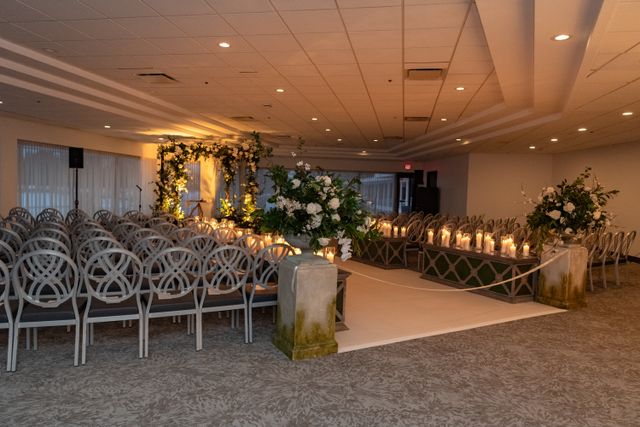 Featured photo from Discover This Romantic Riverwoods Wedding with a Floral-Framed Ceremony and Elegant Country Club Backdrop