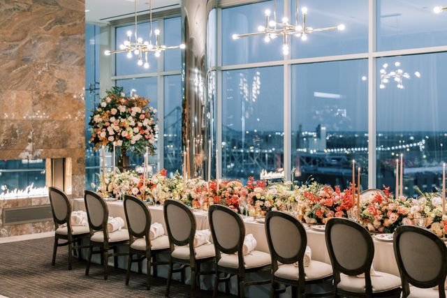 Featured photo from Witness This Elegant City Wedding with a Skyline Dining Room and Coral Floral Tablescapes at Four Seasons Hotel St Louis