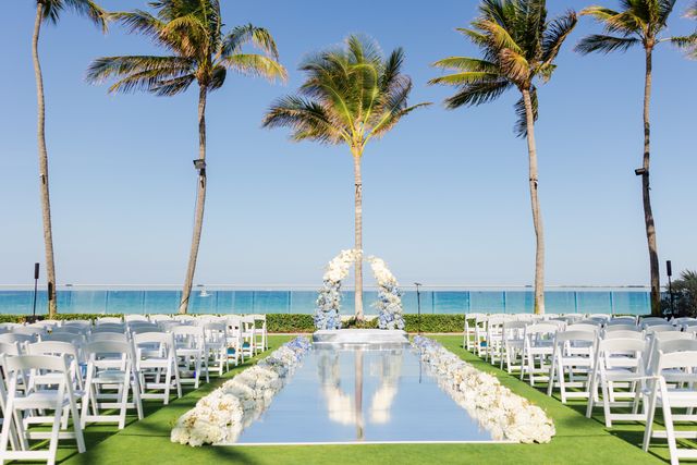 Featured photo from See This Elegant Wedding at The Breakers Palm Beach with Soft Blue Florals and Gilded Reception Details
